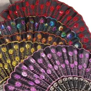 Spanish folding hand fans with colorful sequins and embroidery on black fabric
