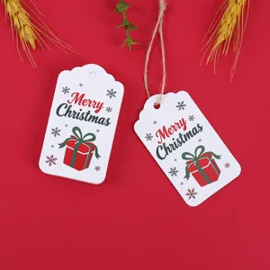 Christmas paper gift tags labels with natural twine string and cute snowflake design