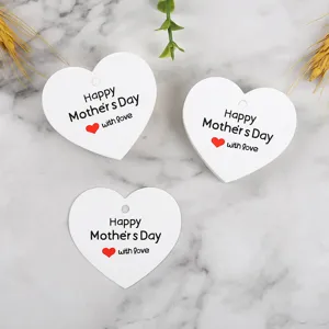 White heart shaped gift tags with Happy Mother's Day text and red heart for holiday decor.