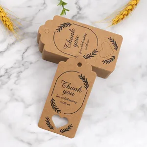 Kraft paper gift tags with heart cutout, thank you hanging tags for wedding party favors.