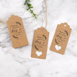 Kraft paper gift tags with hollow heart and thank you text, ideal for wedding favors.