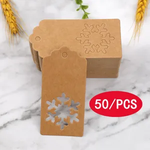 Kraft paper Christmas snowflake gift tags, 50pcs blank hanging labels for holiday decoration.