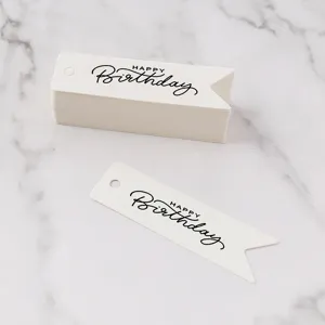 White paper birthday gift tags with swallowtail design and black Happy Birthday print text.