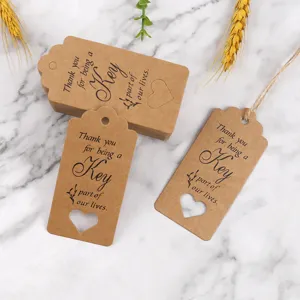 Kraft paper gift tags with hollow heart design, perfect for wedding and party favors packaging decoration.