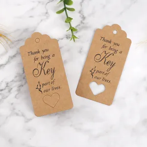 Kraft paper thank you gift tags with heart cut out for packaging and party favor use.