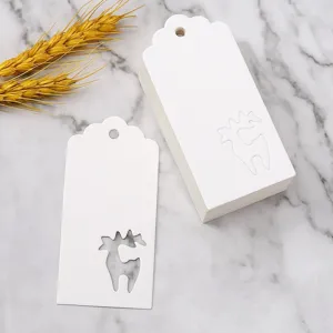 White paper gift tags with hollow elk design, perfect for Christmas packaging and decorations.