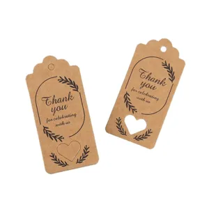 Kraft paper gift tags with thank you text and heart cutouts for party gift packaging.