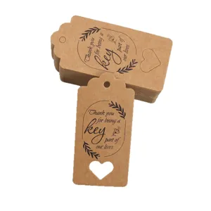 Kraft paper gift tags with hollow heart design, thank you hang tags for wedding favors.