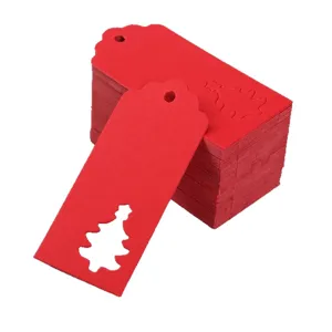 Red paper Christmas gift tags with hollow tree design, bulk pack for holiday decoration.