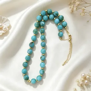 Elegant turquoise color acrylic beaded necklace with gold spacer beads for daily charm.