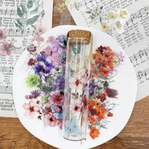 Vintage PET flower stickers set in glass bottle, perfect for journaling and DIY crafts.