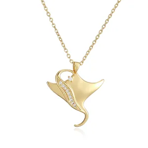 Gold-plated manta ray pendant necklace with sparkling cubic zirconia stones for women.