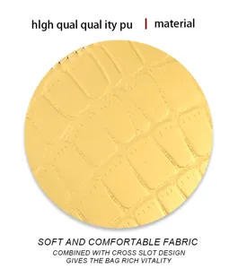 Yellow PU leather crocodile pattern detail, soft and comfortable fabric material close up.