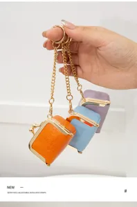 Mini PU leather kiss-lock jewelry box detail, portable mini coin purse with metal chain.