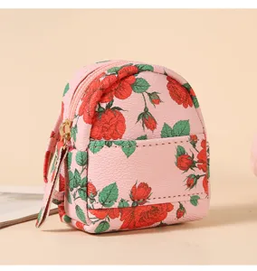 Mini zaino con stampa di rose portamonete simpatica borsa per chiavi ciondolo decorativo.