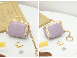 Mini PU leather kiss-lock coin purse with metal chain, compact jewelry storage bag for rings.