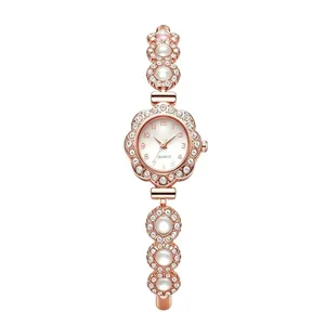Elegante orologio da donna a bracciale in oro rosa con lunetta in cristallo e perle