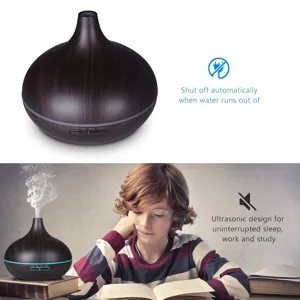 Ultrasonic wood grain essential oil diffuser with auto shut-off and silent design.
