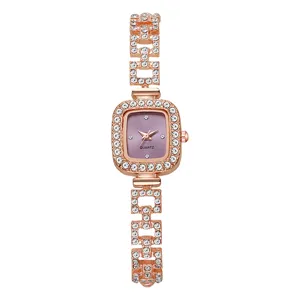 Detailed shot of a luxury rose gold square face watch with crystal bracelet embellishment