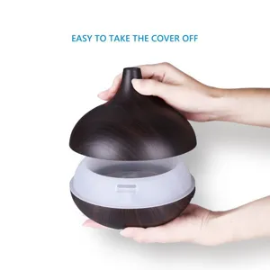 Close-up showing easy removal of the dark wood grain cover on the 400ML humidifier