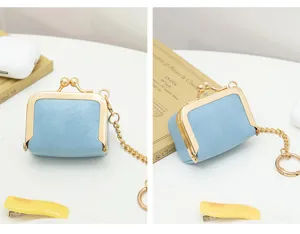 Mini PU leather kiss-lock coin purse detail view, cute blue jewelry storage box with gold chain.