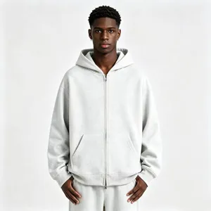 Men's heavy grey zip-up hoodie detail view, showing soft fabric texture and hoodie fit.