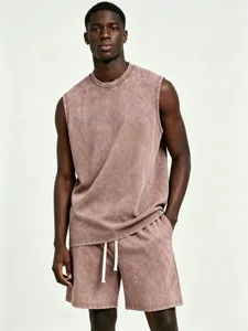 Detail view of men vintage washed sleeveless muscle tank top and matching shorts streetwear set.