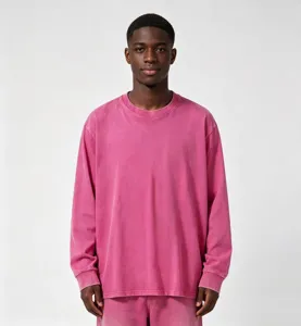 Close-up view of the heavy washed long sleeve t-shirt showing vintage fabric texture and details.