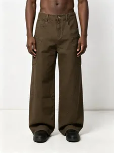 Close-up of dark green utility cargo pants with curved side seams and multiple functional pockets.
