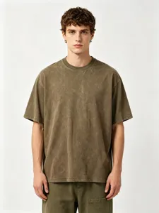 Close-up detail of vintage washed loose fit short sleeve t-shirt with classic crew neck.