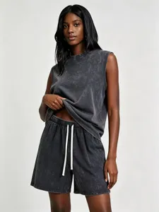Detailed view of stylish dark grey mineral washed sleeveless tank top and shorts set.