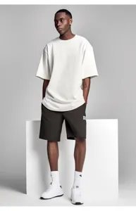 Detailed view of casual men heavyweight loose short sleeve t-shirt and shorts outfit.
