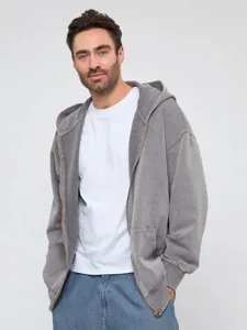 Detailed view of vintage washed heavyweight zip-up hoodie featuring loose fit and comfortable fleece.
