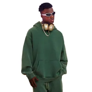 Detailed view of the vintage washed dark green heavy hoodie, showing fabric texture and pocket.
