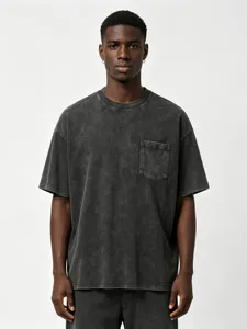 Vintage washed cotton pocket t-shirt detail showing fabric texture and chest pocket design.