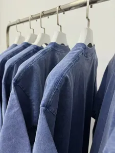 Vintage washed cotton short sleeve t-shirt close up detail view, versatile solid color top.