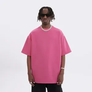Oversized plain pink t-shirt for men, hip hop streetwear short sleeve top with small crew neck.