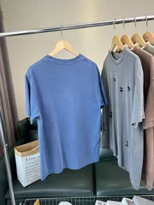 Heavyweight washed distressed short sleeve T-shirt for men and women, loose fit vintage top.