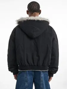 Back view detail of casual black hooded winter padded jacket with faux fur trim and denim.