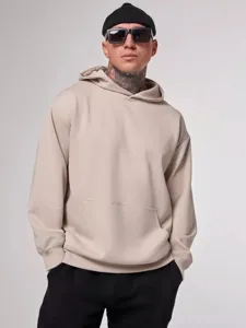 Oversized solid cotton hooded sweatshirt in light beige, comfortable 380g loopback fleece.