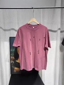 Vintage washed distressed short sleeve t-shirt for men and women, heavy weight cotton top.