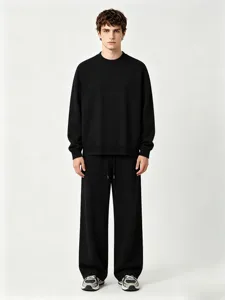 Men's black casual sweatshirt and loose straight sweatpants outfit, comfortable everyday wear.