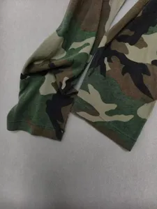 Camouflage long sleeve T-shirt detail, cotton fabric closeup, sleeve cuff and stitching view