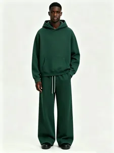 Dark green men hooded sweatshirt and loose sweatpants set for casual autumn winter wear
