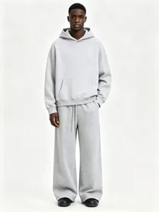 Detailed view of the cozy grey fleece pullover hoodie and matching loose sweatpants set.