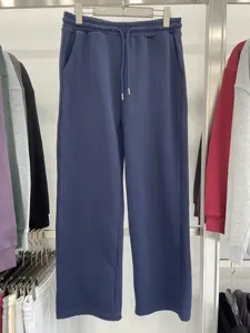 Deep blue casual sweatpants with elastic drawstring waist and relaxed fit for daily wear.