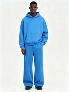 Blue fleece hoodie and sweatpants set detail showing comfortable fit, soft texture and solid color.