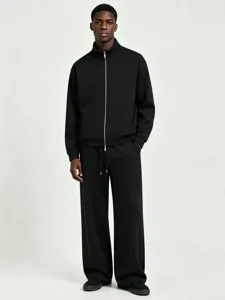 Men black mock neck zip up sweatshirt and wide leg jogger tracksuit set for autumn.