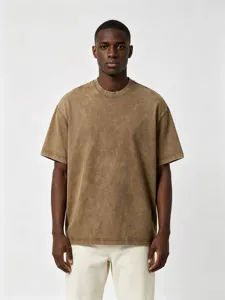 Vintage acid wash oversized short sleeve t-shirt detail showing dropped shoulder fit.