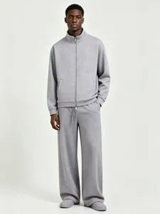 Detail view of the heavy fleece grey stand-collar zip-up jacket and matching sweatpants.